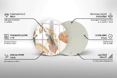 Piatto in vetro per candele con decorazione di piume e foglie in stile boho