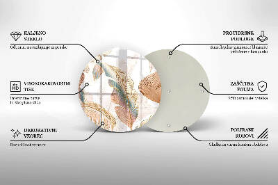 Piatto in vetro per candele con decorazione di piume e foglie in stile boho