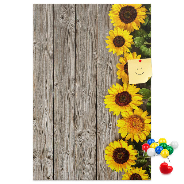 Bacheca in sughero con stampa di girasoli su sfondo in legno
