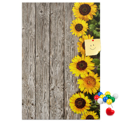 Bacheca in sughero con stampa di girasoli su sfondo in legno