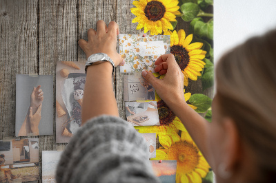 Bacheca in sughero con stampa di girasoli su sfondo in legno