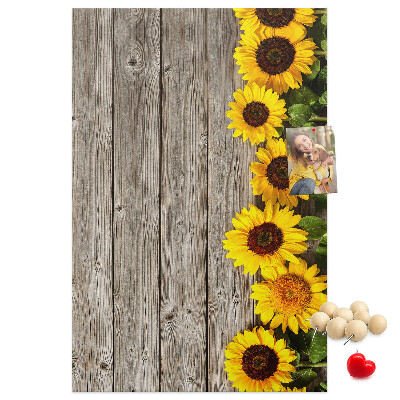 Bacheca in sughero con stampa di girasoli su sfondo in legno