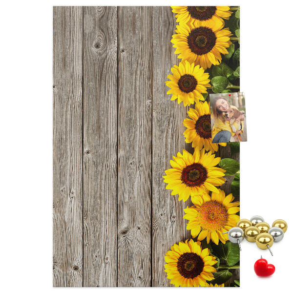 Bacheca in sughero con stampa di girasoli su sfondo in legno