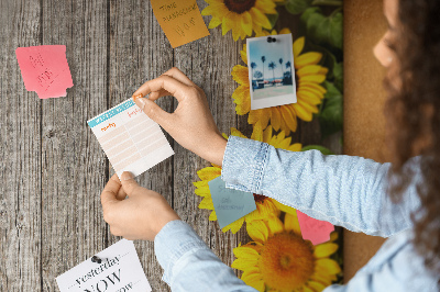 Bacheca in sughero con stampa di girasoli su sfondo in legno