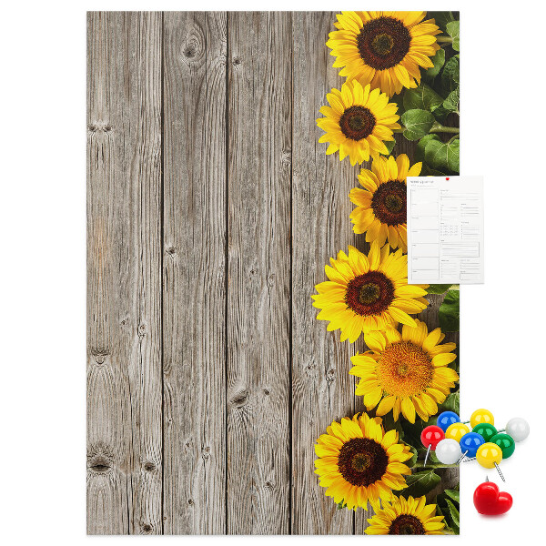 Bacheca in sughero con stampa di girasoli su sfondo in legno