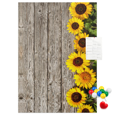 Bacheca in sughero con stampa di girasoli su sfondo in legno