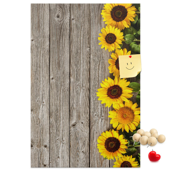 Bacheca in sughero con stampa di girasoli su sfondo in legno