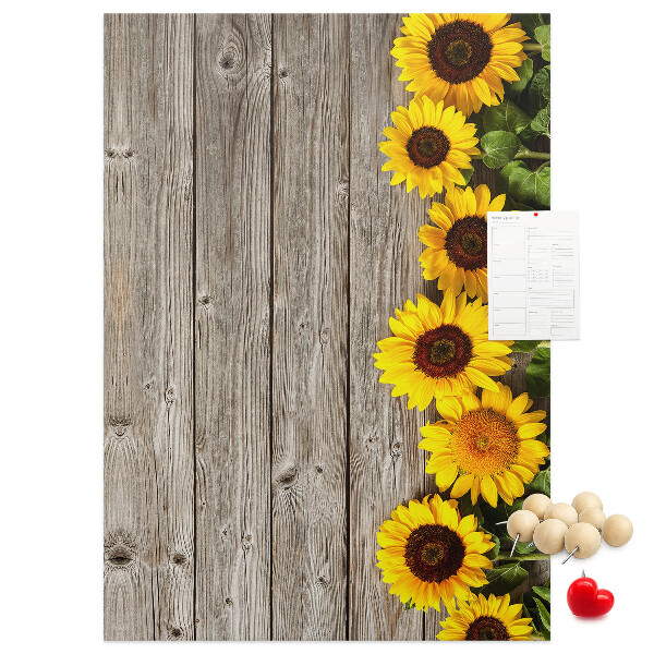 Bacheca in sughero con stampa di girasoli su sfondo in legno