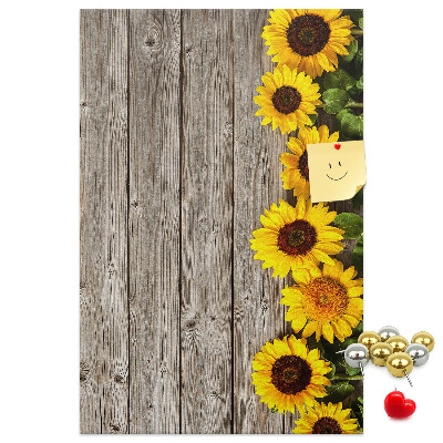 Bacheca in sughero con stampa di girasoli su sfondo in legno