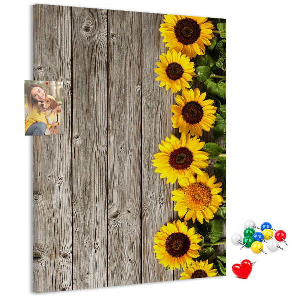 Bacheca in sughero con stampa di girasoli su sfondo in legno