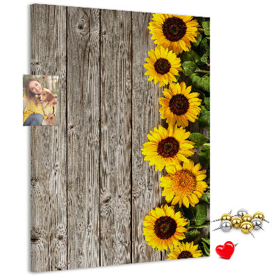 Bacheca in sughero con stampa di girasoli su sfondo in legno