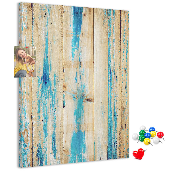 Bacheca di sughero con cornice in legno anticato e dettagli blu