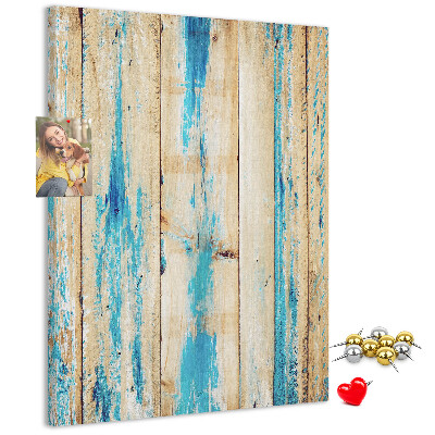 Bacheca di sughero con cornice in legno anticato e dettagli blu