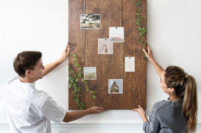 Lavagna in sughero con cornice in legno rustico e rami verdi decorativi