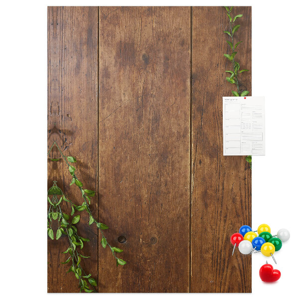 Lavagna in sughero con cornice in legno rustico e rami verdi decorativi