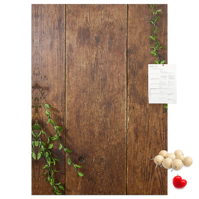 Lavagna in sughero con cornice in legno rustico e rami verdi decorativi