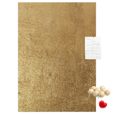 Bacheca di sughero con carta dorata e spilli colorati