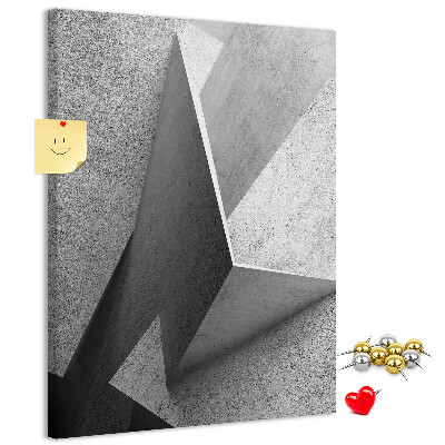 Bacheca di sughero con geometrie concrete in diverse tonalità di grigio