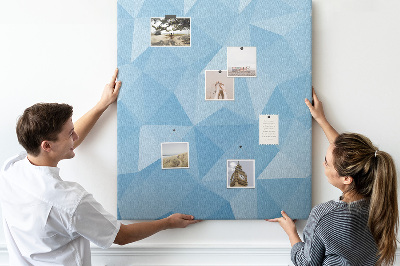 Bacheca di sughero con stampa a forme geometriche in varie tonalità di blu