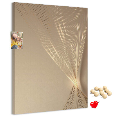 Bacheca di sughero con stampa di linee delicate su sfondo beige