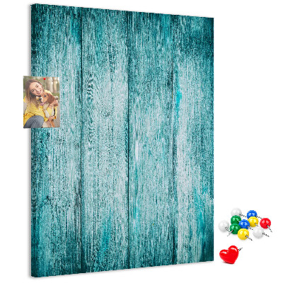 Bacheca di sughero con sfondo in assi di legno blu effetto soleggiato