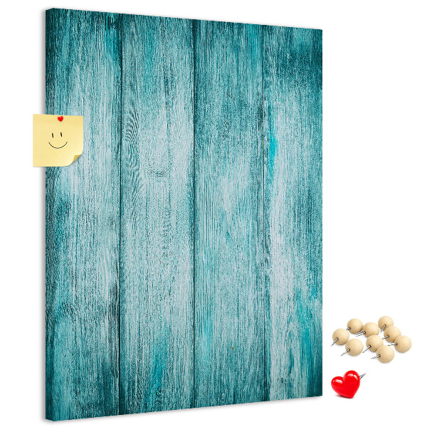 Bacheca di sughero con sfondo in assi di legno blu effetto soleggiato