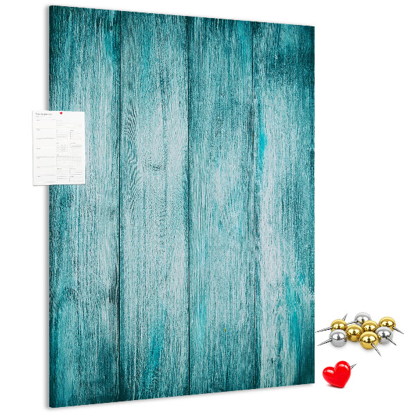 Bacheca di sughero con sfondo in assi di legno blu effetto soleggiato