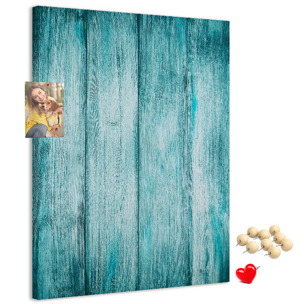 Bacheca di sughero con sfondo in assi di legno blu effetto soleggiato