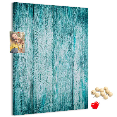 Bacheca di sughero con sfondo in assi di legno blu effetto soleggiato