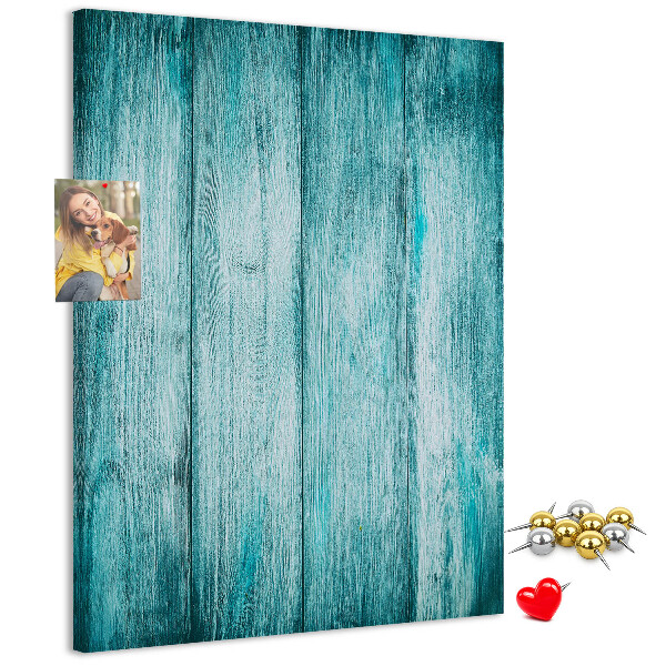 Bacheca di sughero con sfondo in assi di legno blu effetto soleggiato