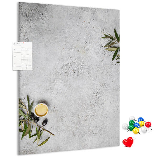 Lavagna in sughero con sfondo minimalista e accenti verde oliva