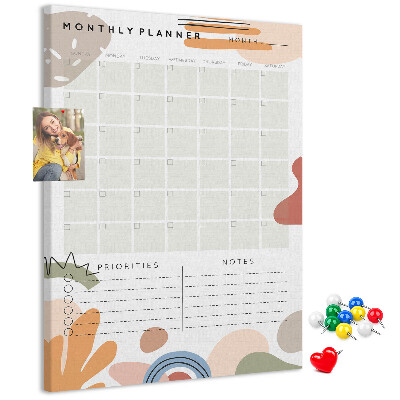 Bacheca di sughero agenda mensile colorata con forme astratte