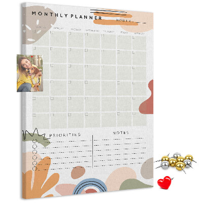 Bacheca di sughero agenda mensile colorata con forme astratte