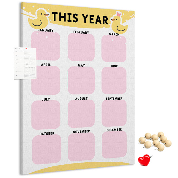 Bacheca di sughero con un allegro calendario a motivo uccellino