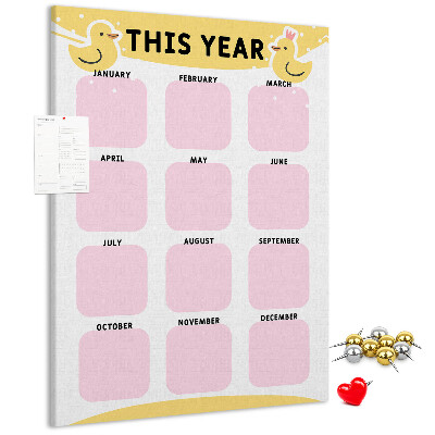 Bacheca di sughero con un allegro calendario a motivo uccellino