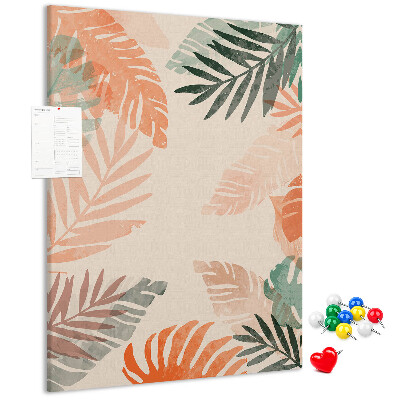 Bacheca di sughero con stampa di foglie tropicali dai colori delicati