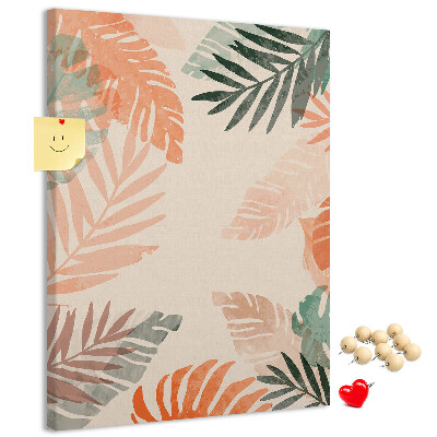 Bacheca di sughero con stampa di foglie tropicali dai colori delicati