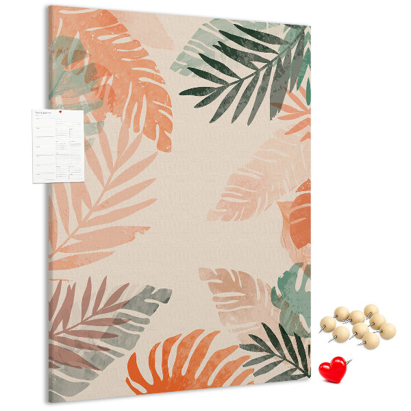 Bacheca di sughero con stampa di foglie tropicali dai colori delicati