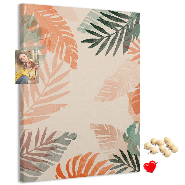 Bacheca di sughero con stampa di foglie tropicali dai colori delicati