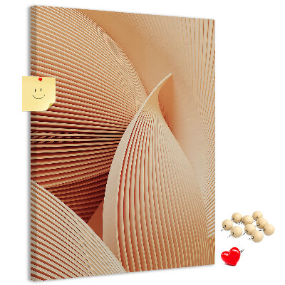 Lavagna in sughero con stampa di onde e curve nelle sfumature del beige
