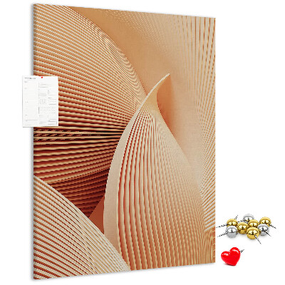 Lavagna in sughero con stampa di onde e curve nelle sfumature del beige