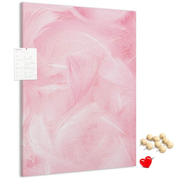 Bacheca di sughero con stampa di delicate piume rosa su sfondo