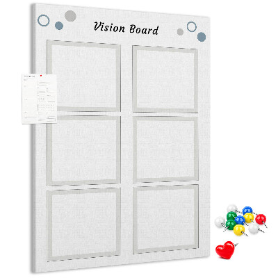 Bacheca di sughero con cornici vuote per vision board