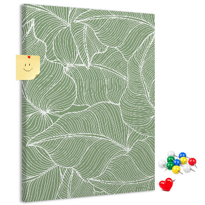 Bacheca di sughero con stampa di foglie delicate su sfondo verde