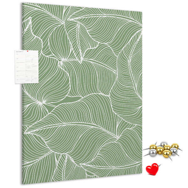 Bacheca di sughero con stampa di foglie delicate su sfondo verde