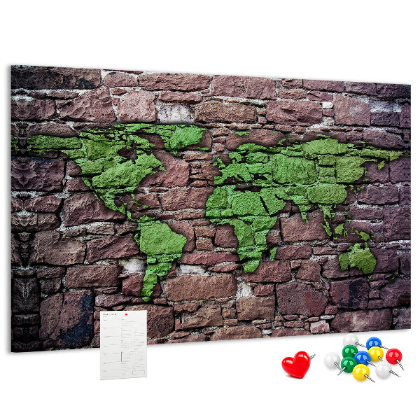 Bacheca in sughero mappa del mondo verde su muro di pietra