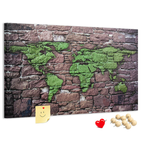 Bacheca in sughero mappa del mondo verde su muro di pietra
