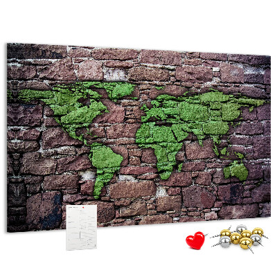 Bacheca in sughero mappa del mondo verde su muro di pietra
