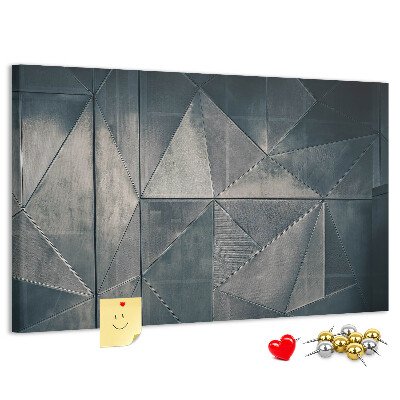 Lavagna di sughero con forme geometriche in diverse tonalità di grigio