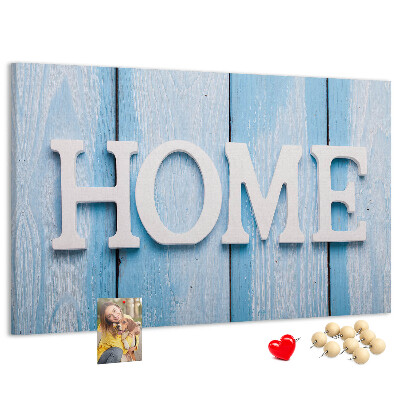 Bacheca in sughero con scritta decorativa Home su sfondo blu